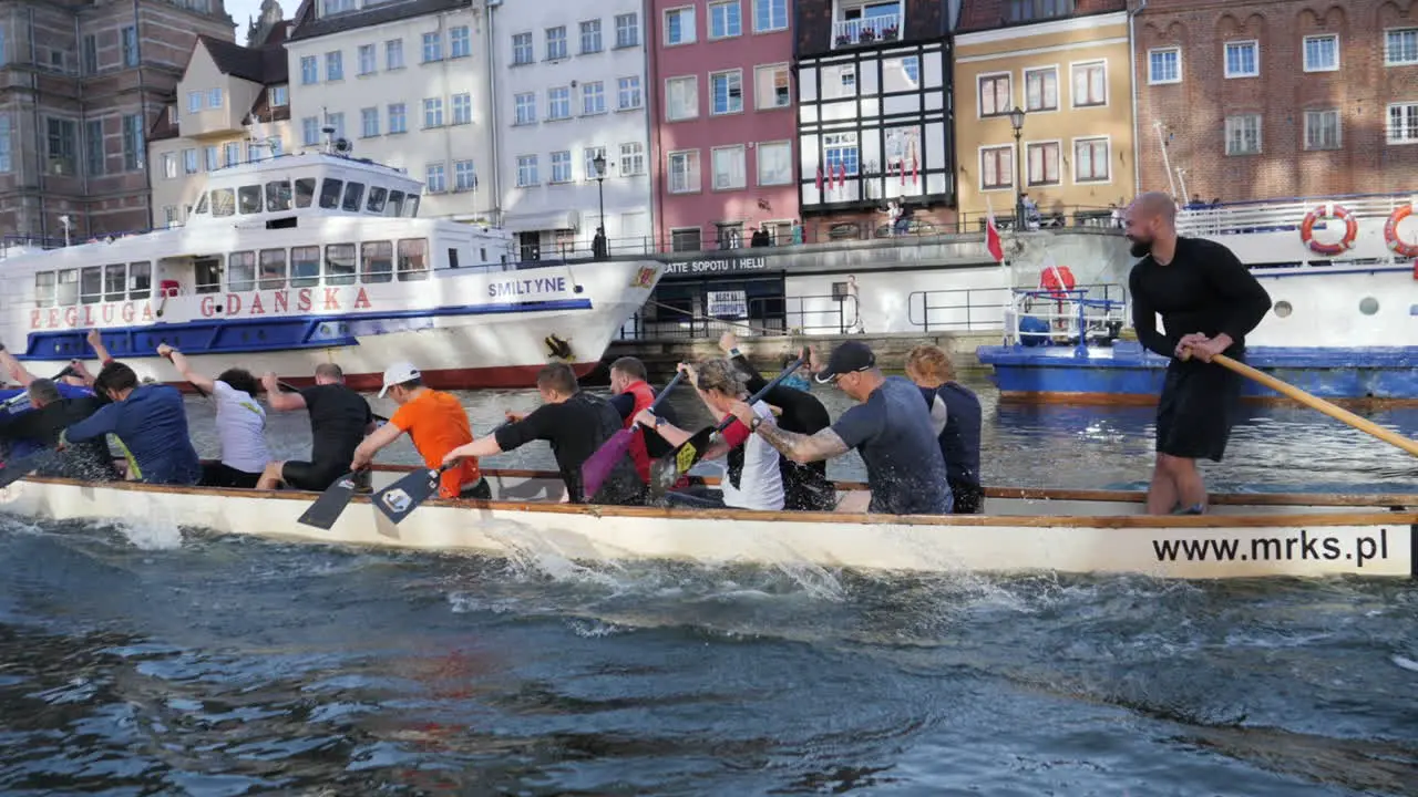 Rowing team in Gdansk canal slow motion