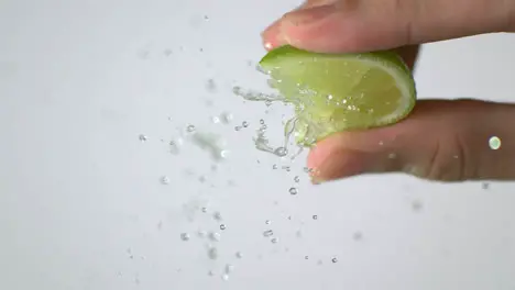 Squeezing Slice of Lime Super Slow Motion