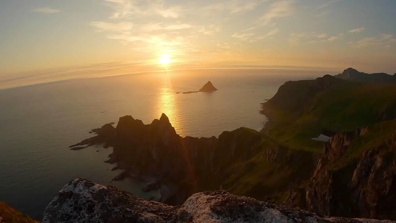 Time lapse of midnight sun on the famous peak Matinden Northern Norway