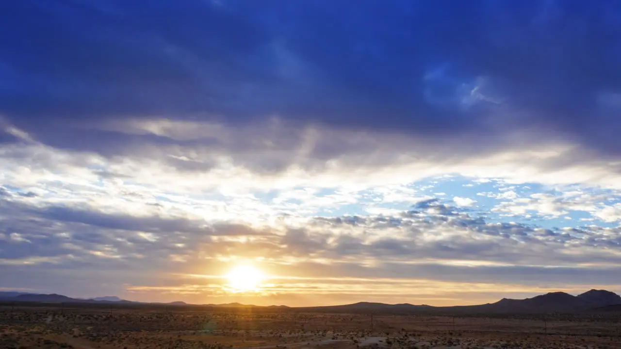 Inspirationally colorful desert hyperlapse at suset aerial sliding view