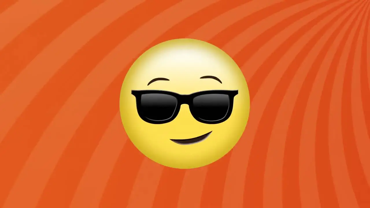 Animation of sunglasses face emoji against radial rays in seamless pattern on orange background