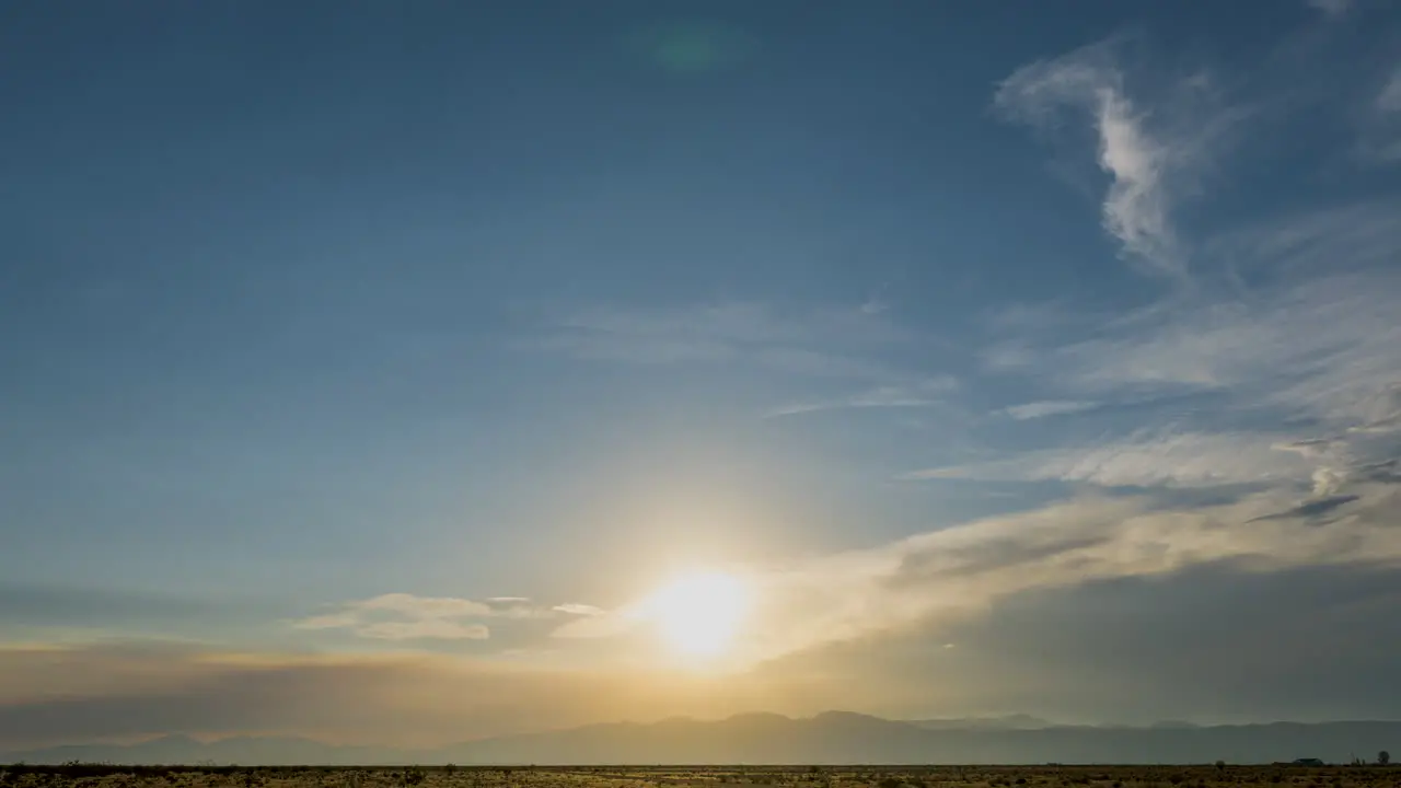 Smoke from the Lake Fire in California mixes with clouds over the Mojave Desert landscape at sunset in this tragic time lapse at wildfire season