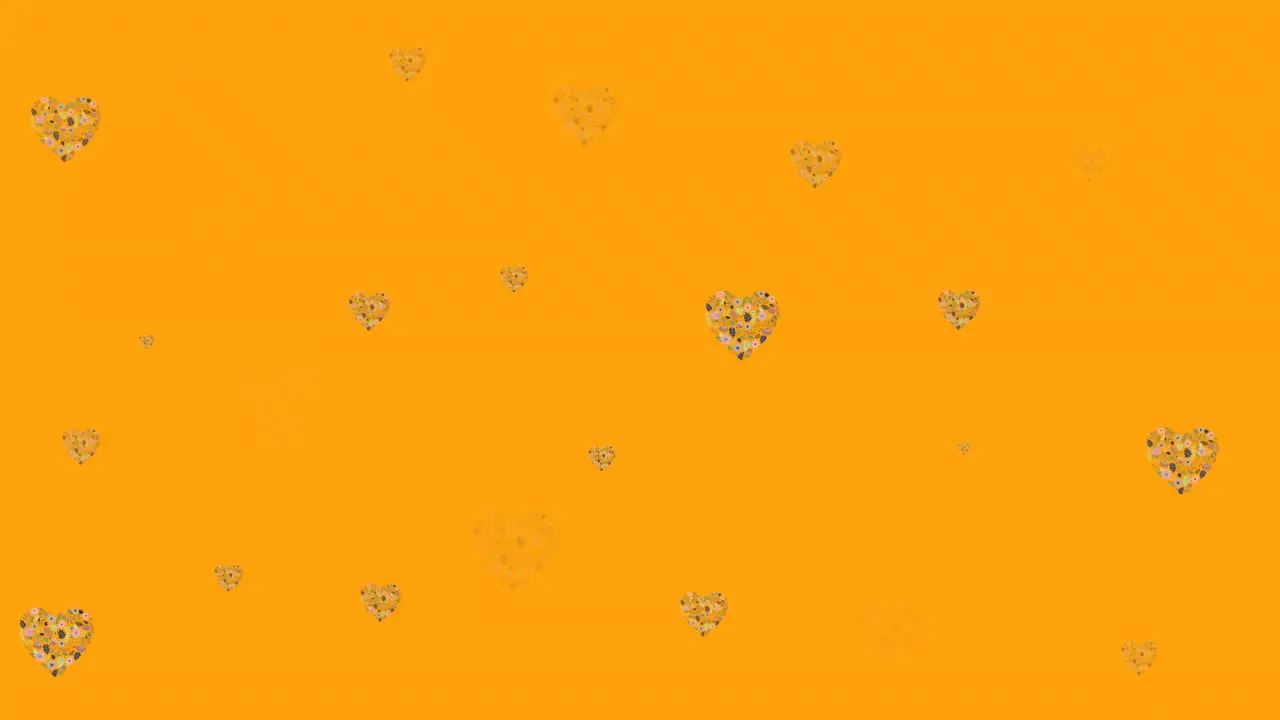 Animation of flower hearts moving in hypnotic motion on orange background