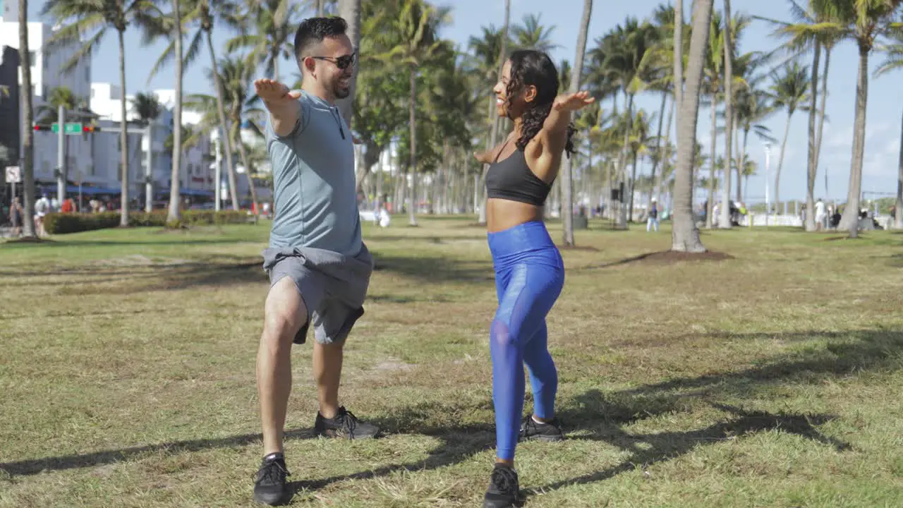 Cheerful couple practicing sport together