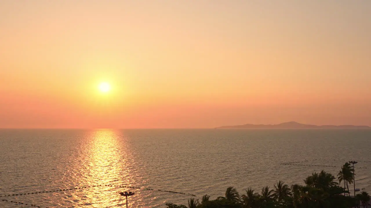 Amazing shot of sea at sunset and vibrant pink-orange colorful sky