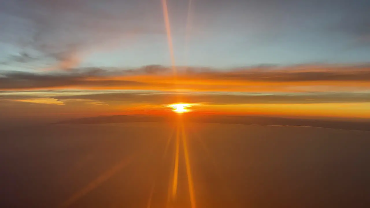 Incredible sunset over the Mediterranean sea from a jet cockpit flying westbound naer Valencia’s coast Spain