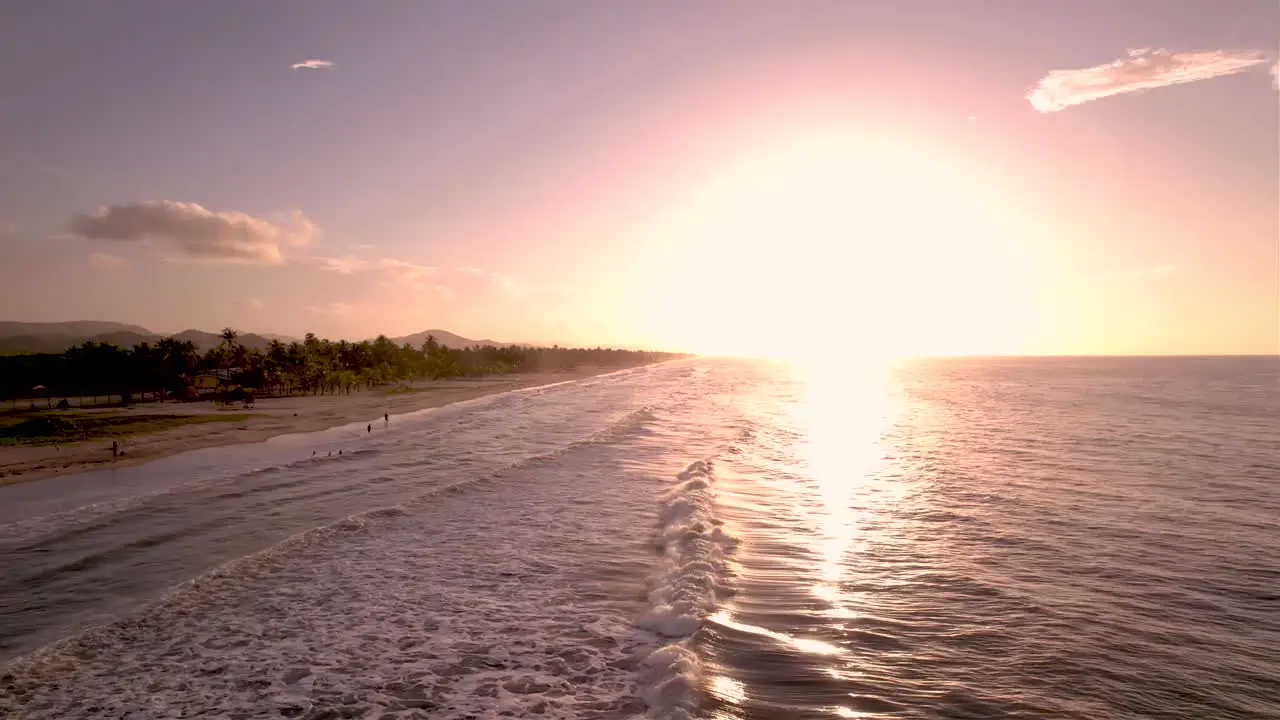 Sunset from a drone over a Caribbean Sea beach of Venezuela