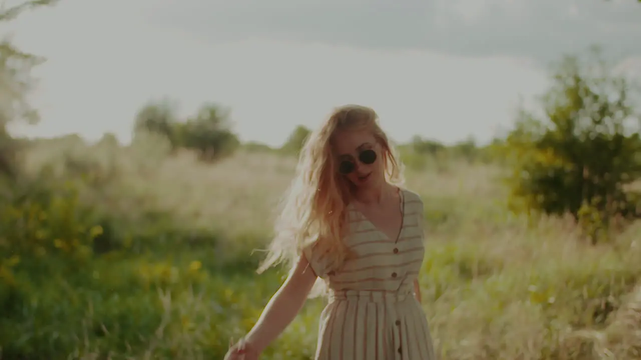 Happy Attractive Joyful Woman Hippie Dancing And Walking In The Sun