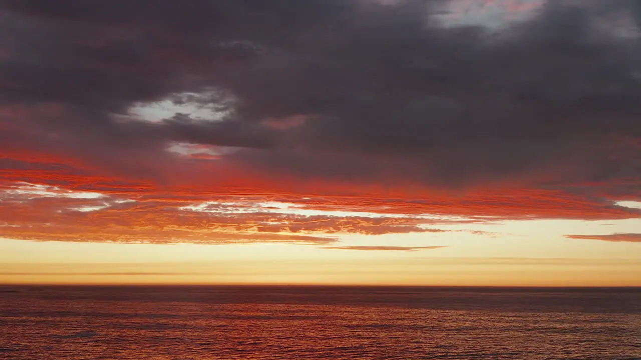 Quiet And Beautiful Orange Sunset In Bakoven Cape Town South Africa wide shot