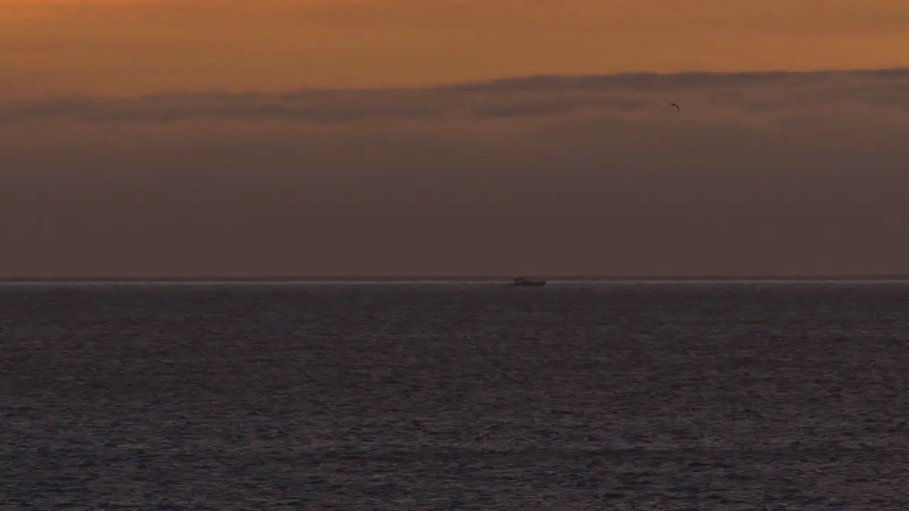 Boat Drone Follow At Sunset On An ocean