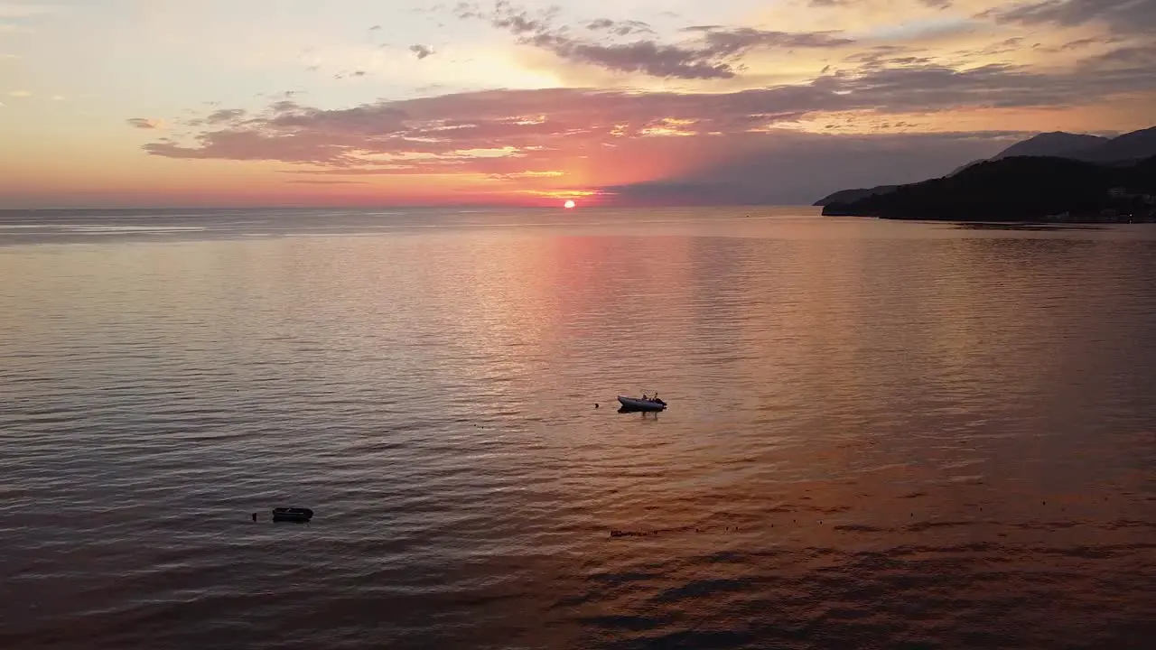 Aerial sunset on the sea breathtaking view of the sun setting over the ocean