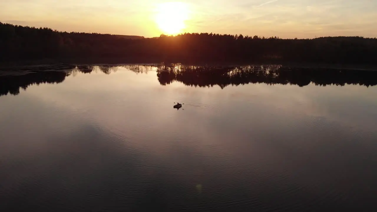 Rubber Boat In The Middle Of A Peaceful Lake During Golden Hour Near The Village Of Rogowko Poland