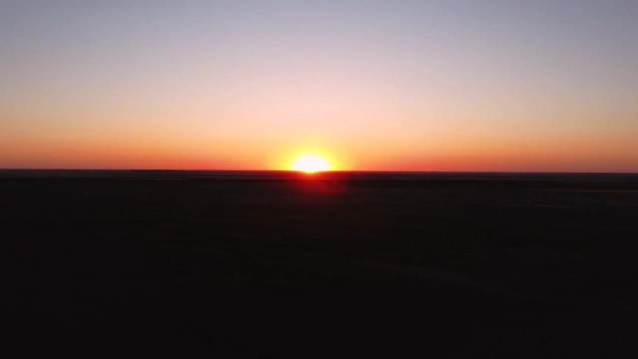 The Sun sets over the Horizon on the agriculture field