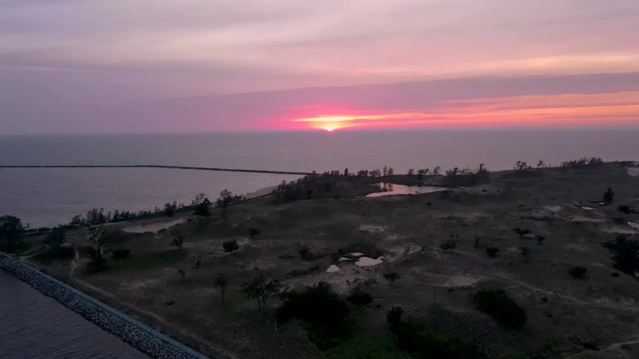 A sunset of pinks and oranges over North Muskegon in Michigan