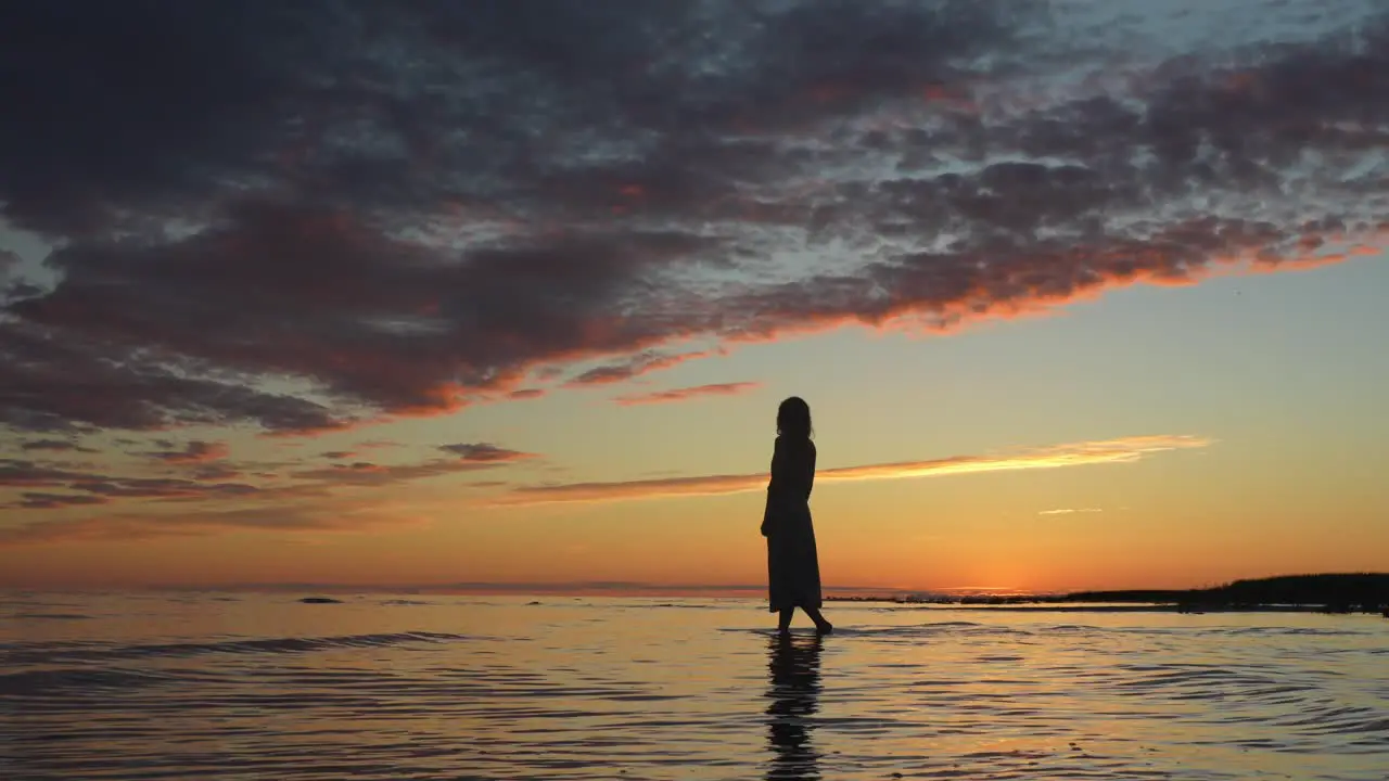 Lady silhouette figure walking on water force of nature