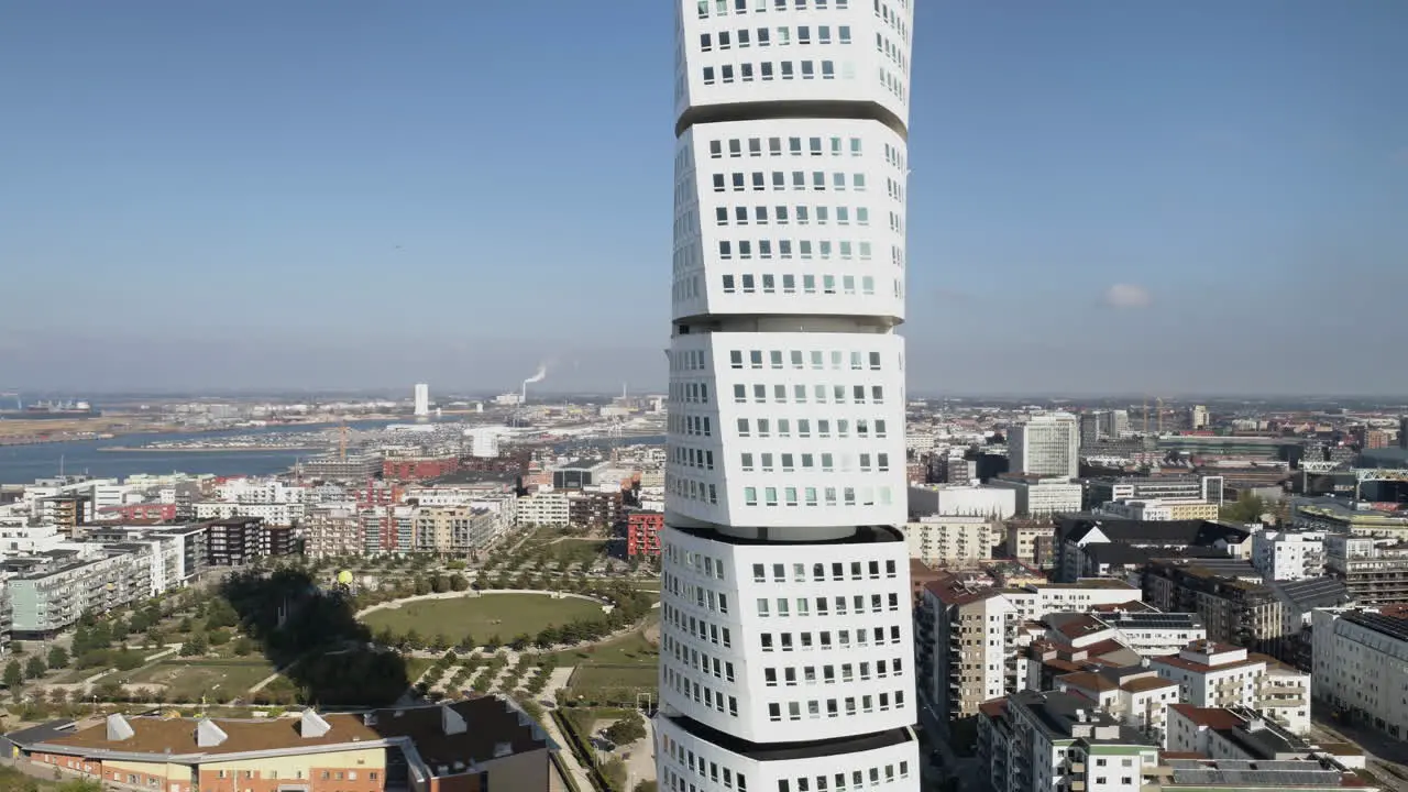 Turning torso skyscraper white building apartment office aerial drone skyline Malmö Swedish Sweden city wide view Scandinavian design landscape visit local construction tall buildings Stockholm high