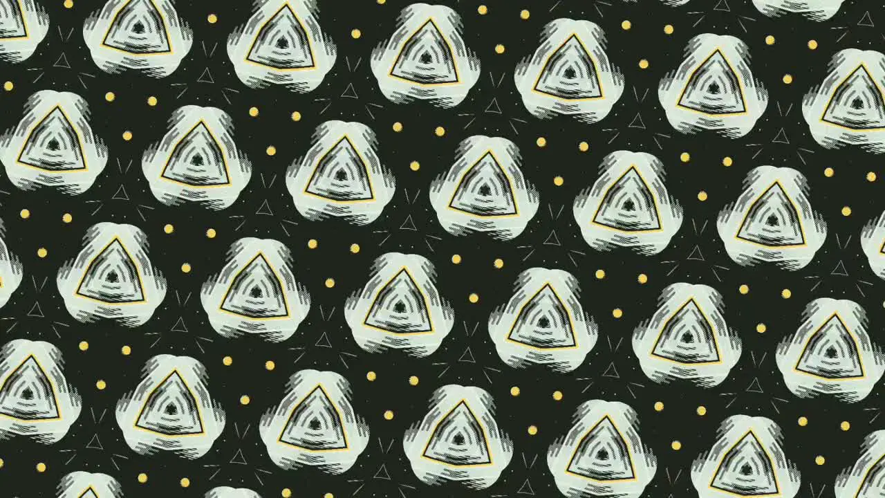 Animation of white triangles arranged symmetrically in rows and rotating on black background