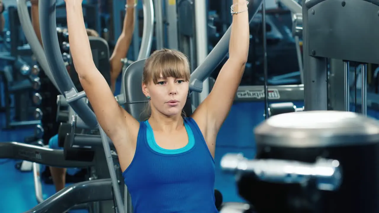 A young woman trains on a simulator 1