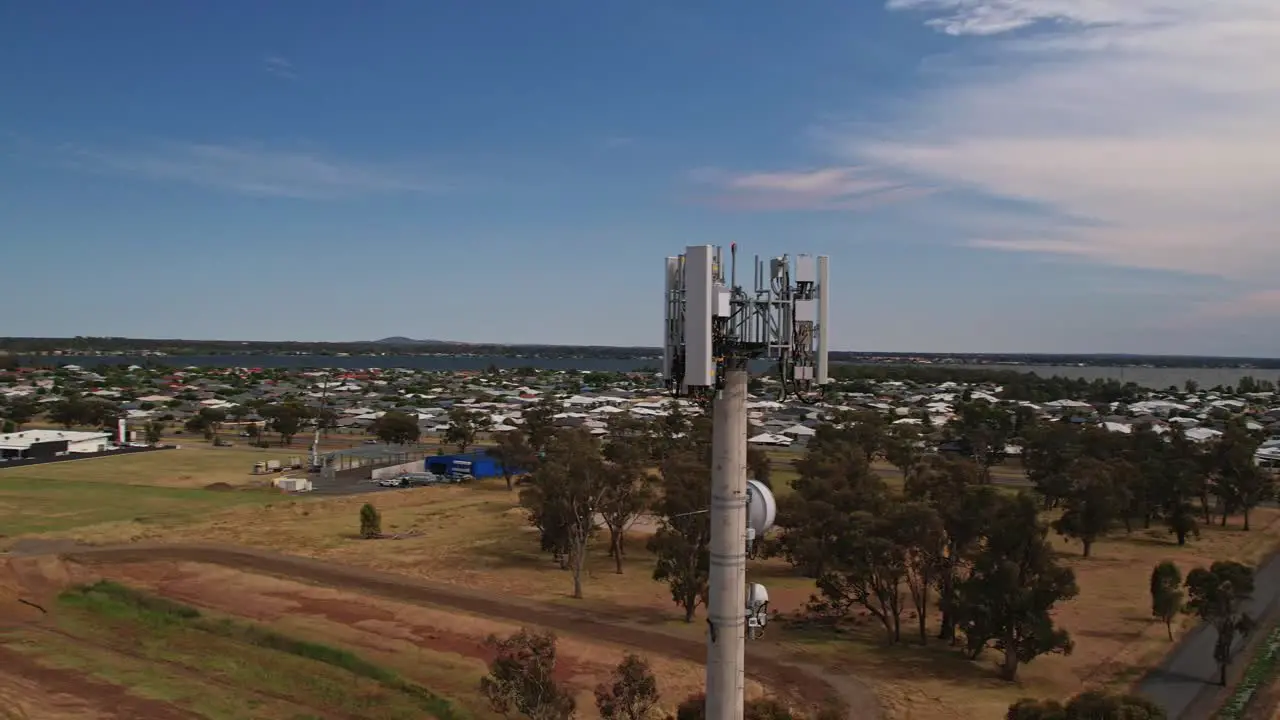 Aerial circle around mobile phone tower with Lake Mulwala and Yarrawonga in the background