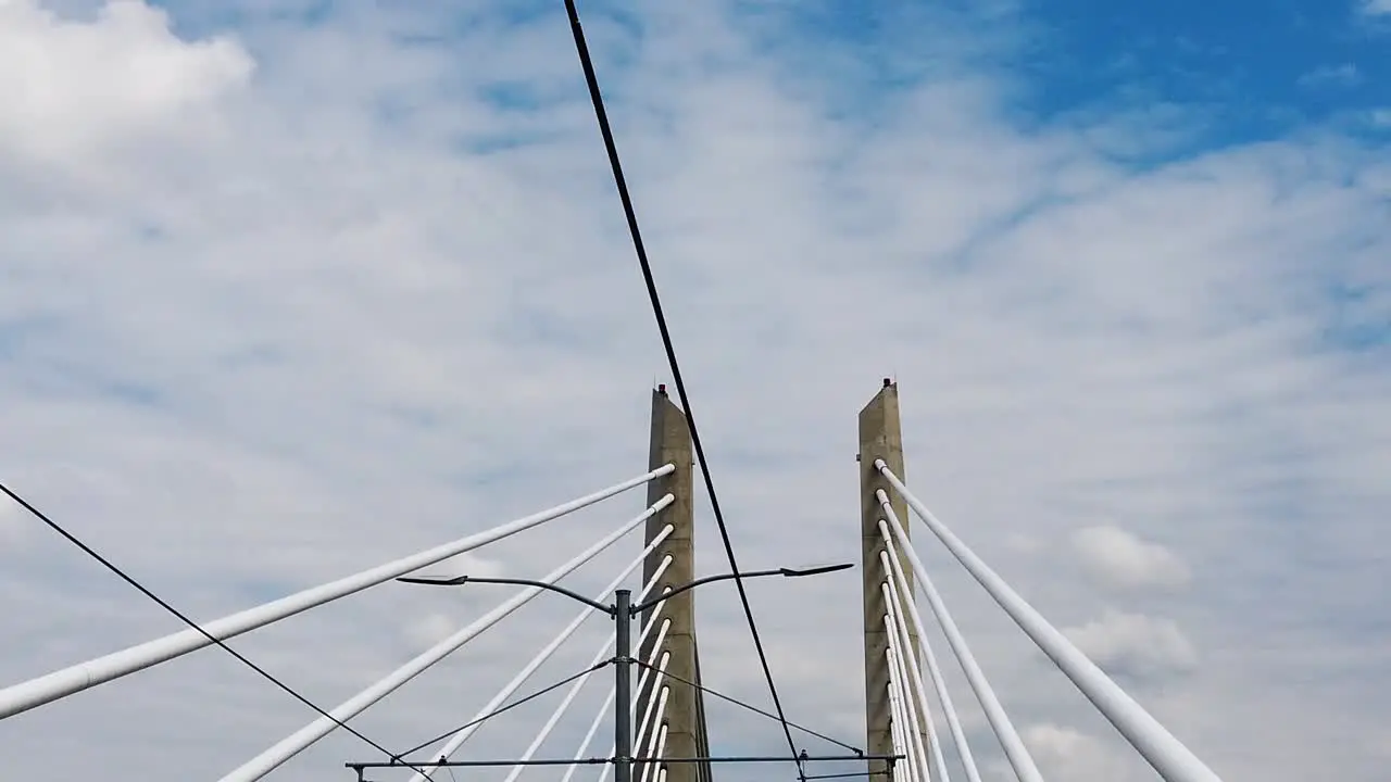 HD Nice shot looking up going across Tilikum Crossing Bridge in Portland Oregon with mostly cloudy sky take seven