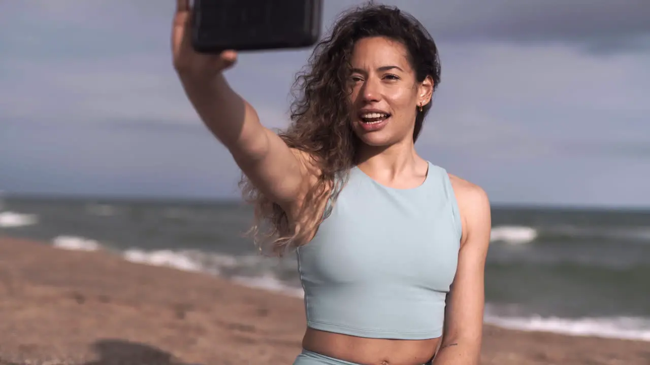 Virtual yoga class training by Latino Yogi at Llevant Barcelona Beach