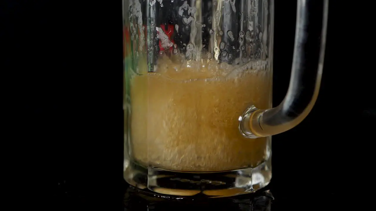 Pouring in beer in a glas