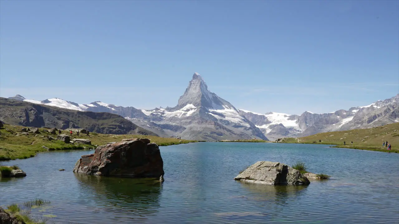 Timelapse Matterhorn with alpine lake Stellisee in Zermatt Switzerland Europe