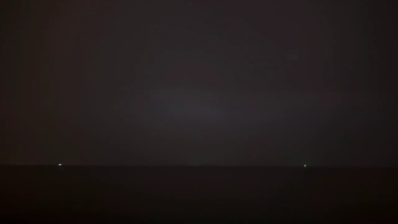 Timelapse of night thunderstorm over the sea