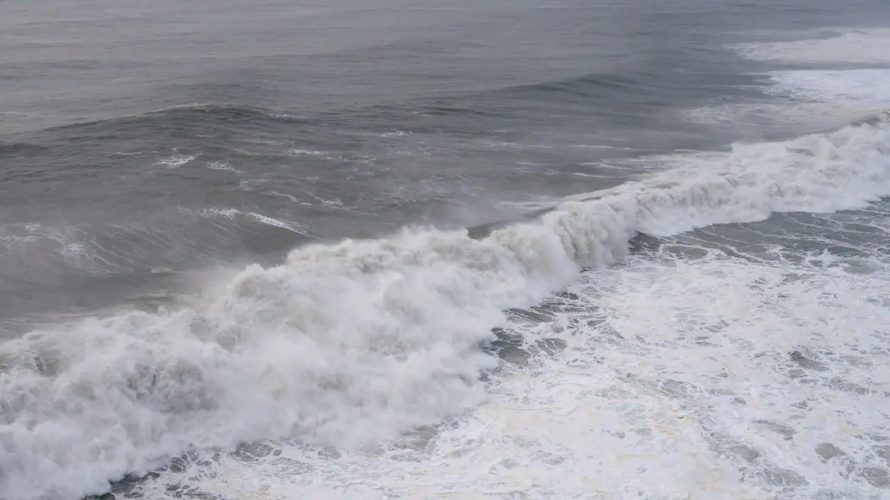 Seascape with big ocean waves crushing against the coast with big splash