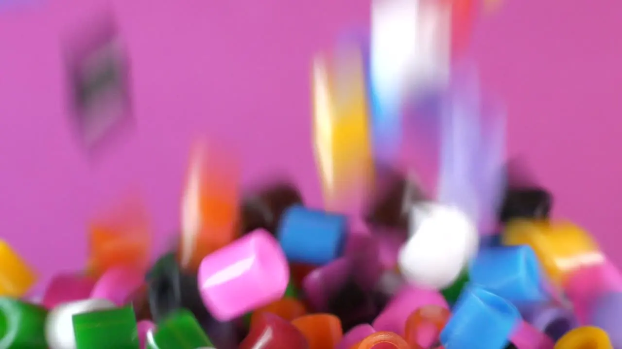 Colorful background of multi color beads raining down