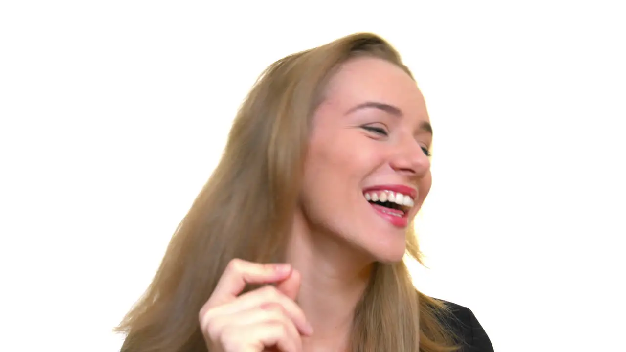 Laughing business woman on a white studio background