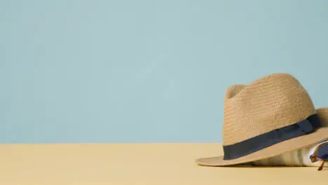 Summer Holiday Concept Of Sun Hat Sunglasses On Beach Towel 1