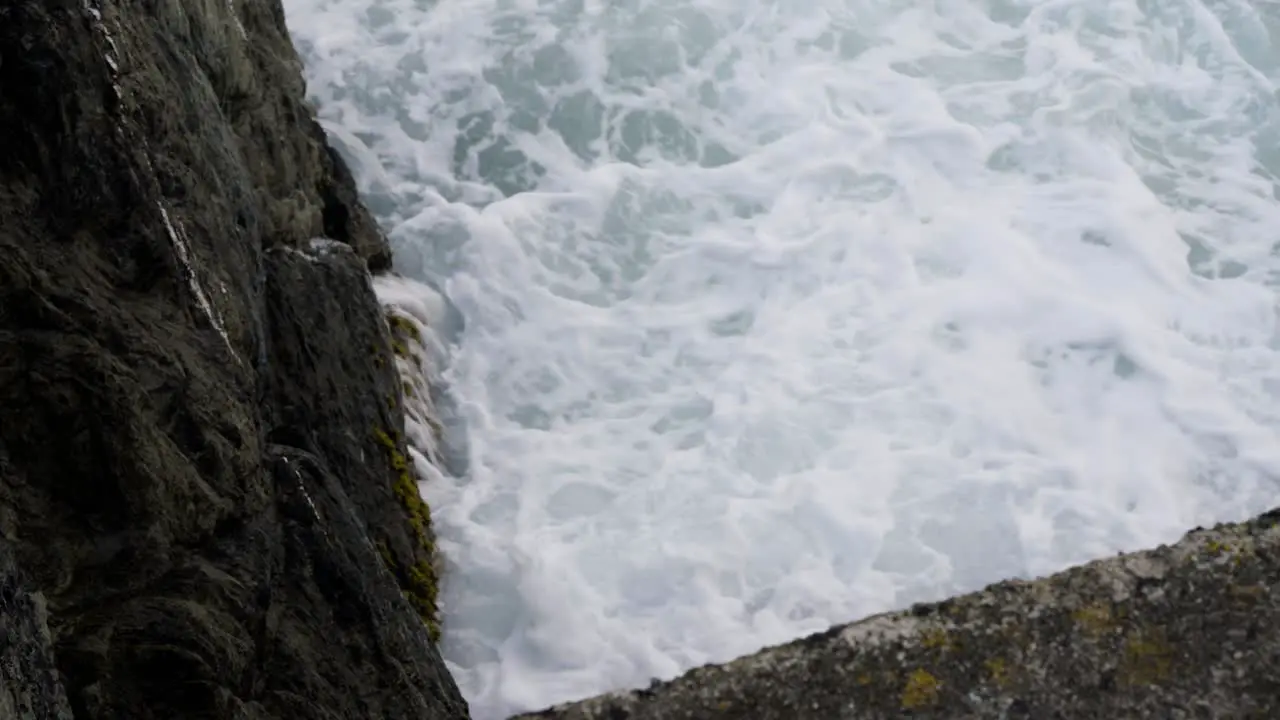 Stormy Waves Hit On The Rocky Shore Of Newquay Harbour In Cornwall United Kingdom