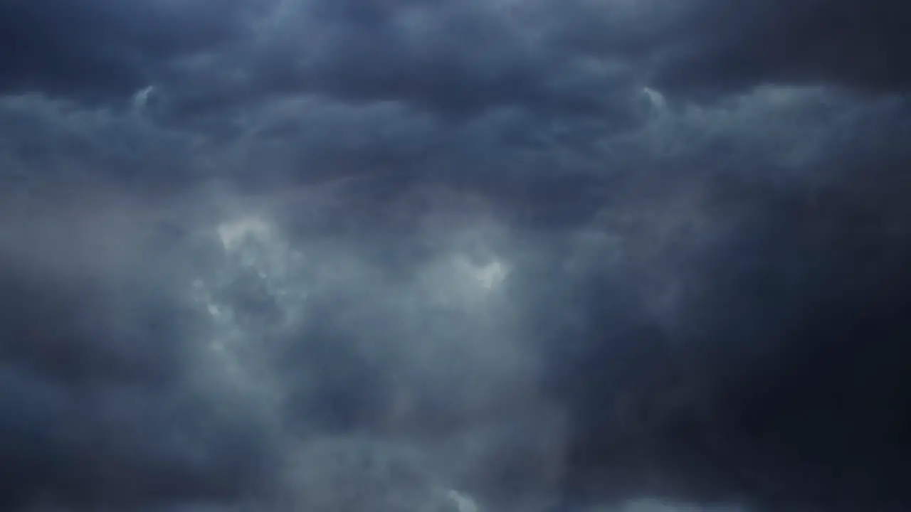 4k thunderstorm flying through in dark sky