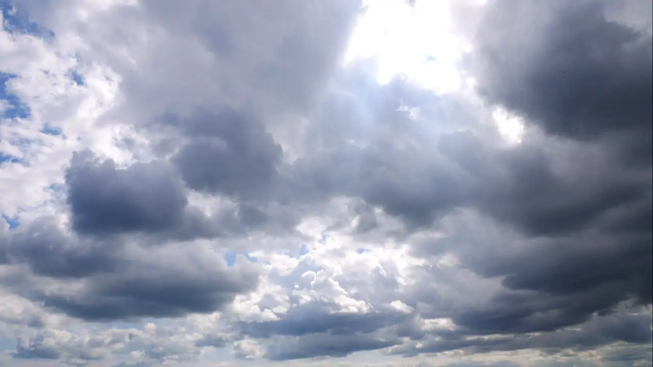 Heavenly light shining through storm clouds