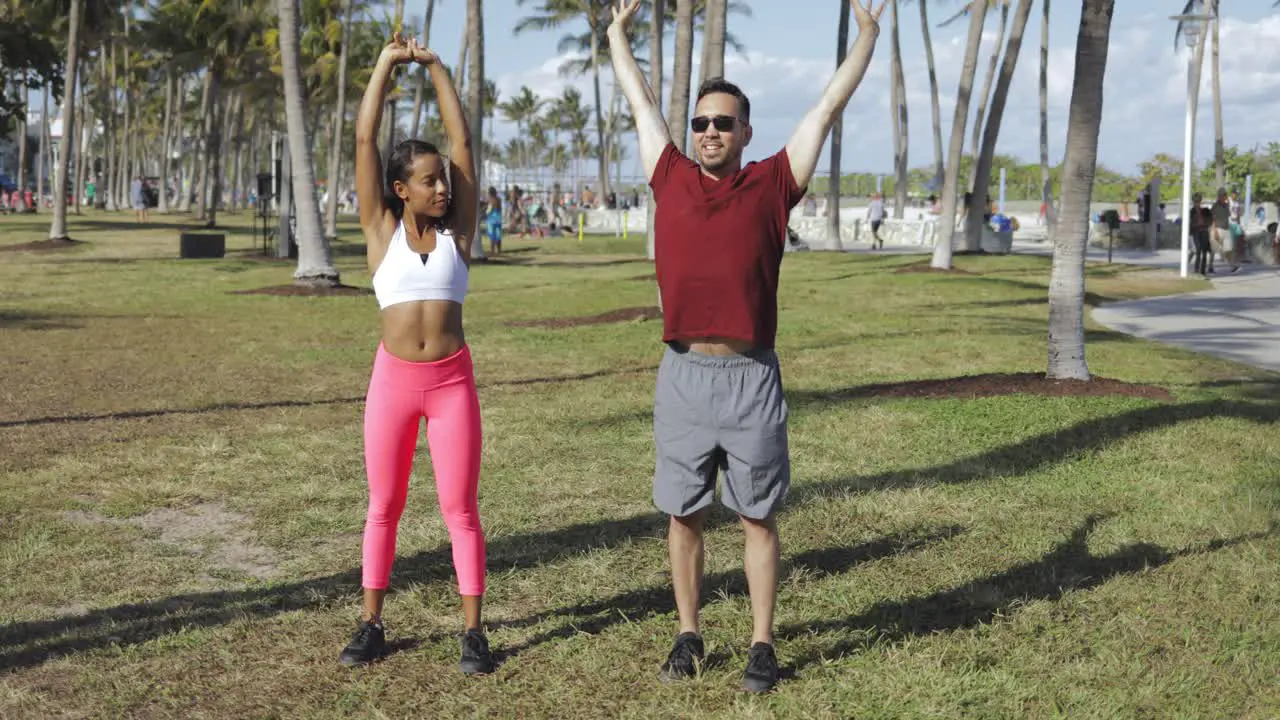 Couple training in park together