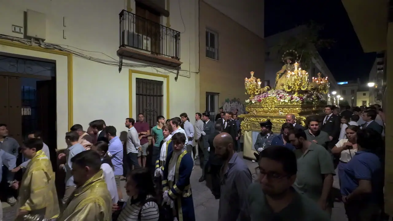 Religious parade procession in the streets of Seville Spain