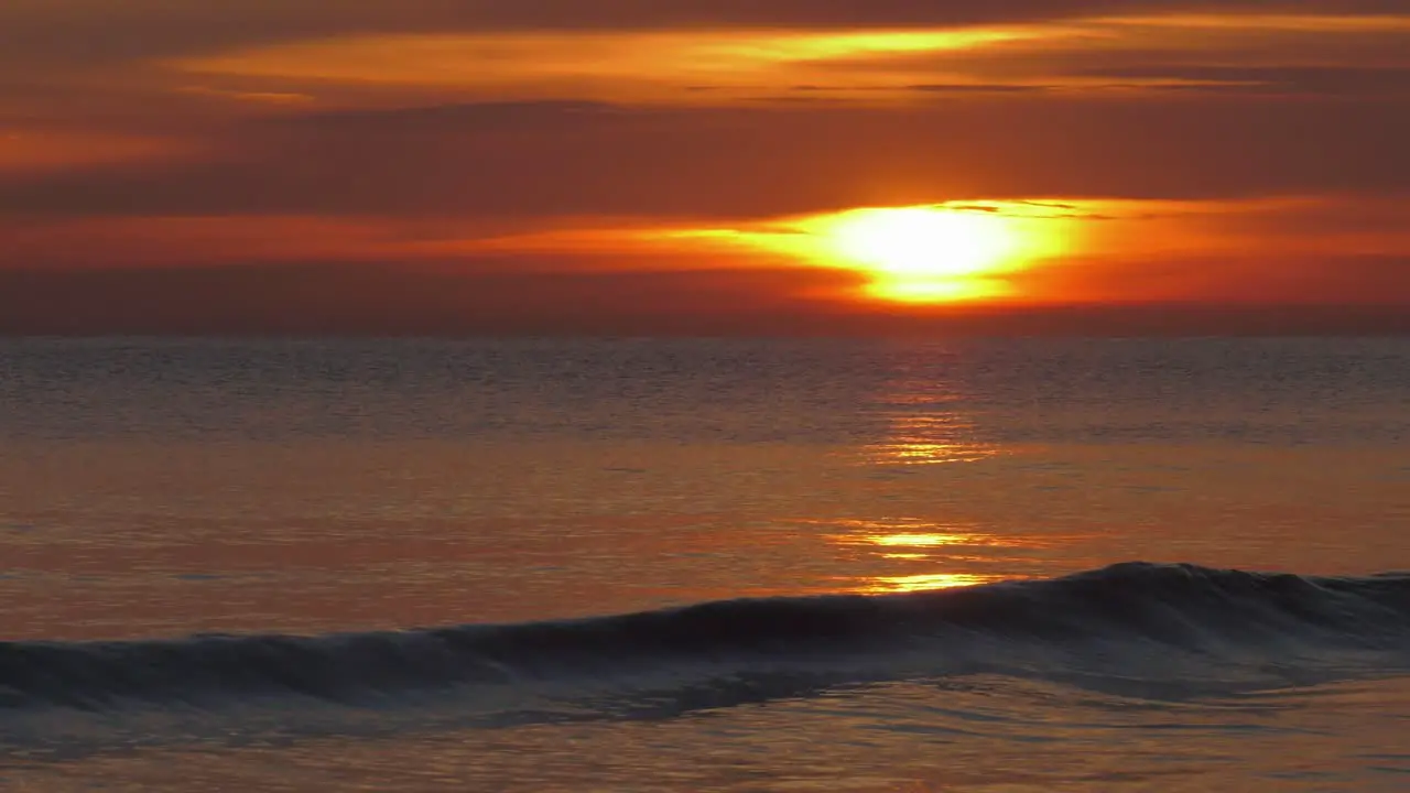 Hazy sunrise sky over calm sea at dawn mediterranean spain