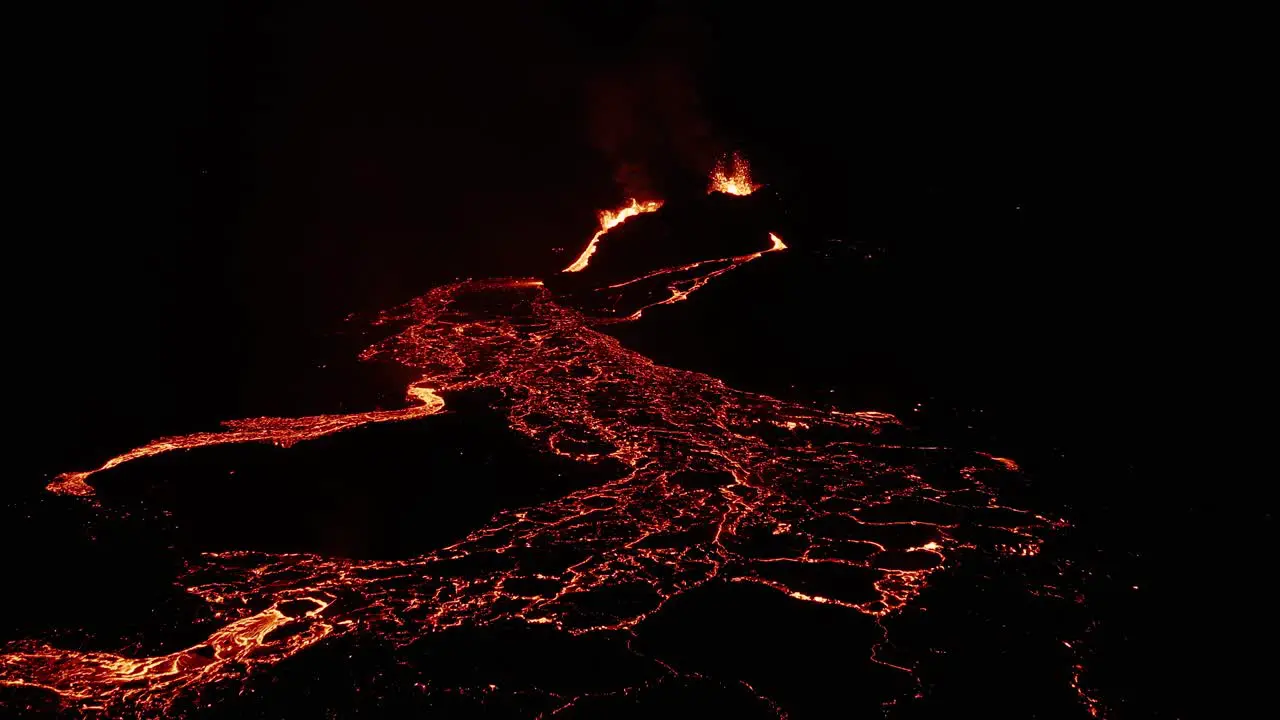 Calm burning lava river at night during erupting Geldingadalsgos in Iceland