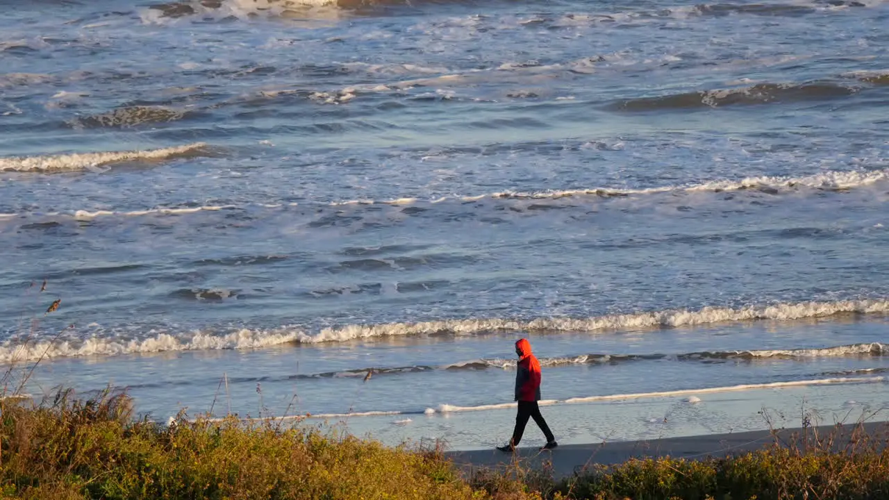 Texas Mustang Island Man In Red Coat