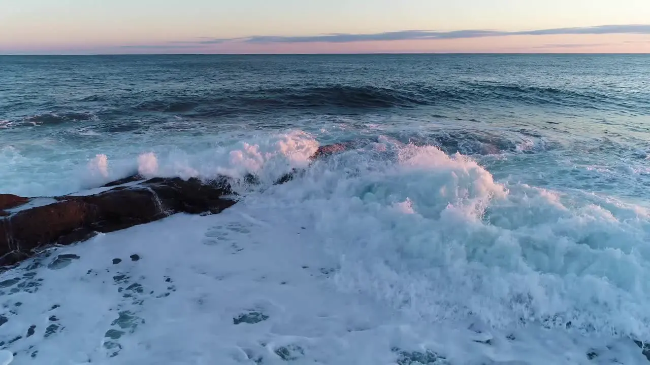 Waves crashing to the rocks