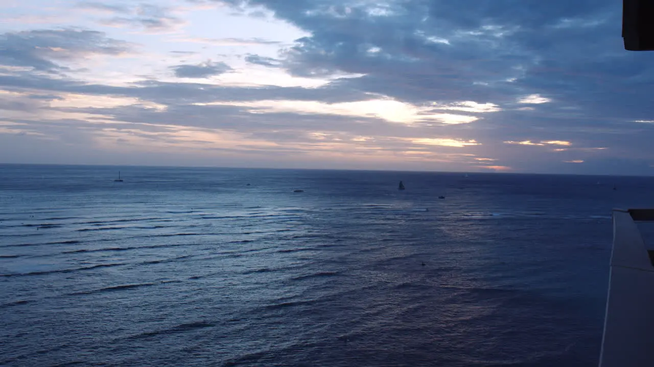 Yachts Sailing on Glistening Ocean Waves During Sunset View From Balcony Slomo Waikiki Bay