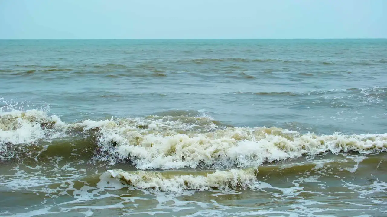 Murky Waves Crashing during Windy Weather Bay of Bengal Indian Ocean