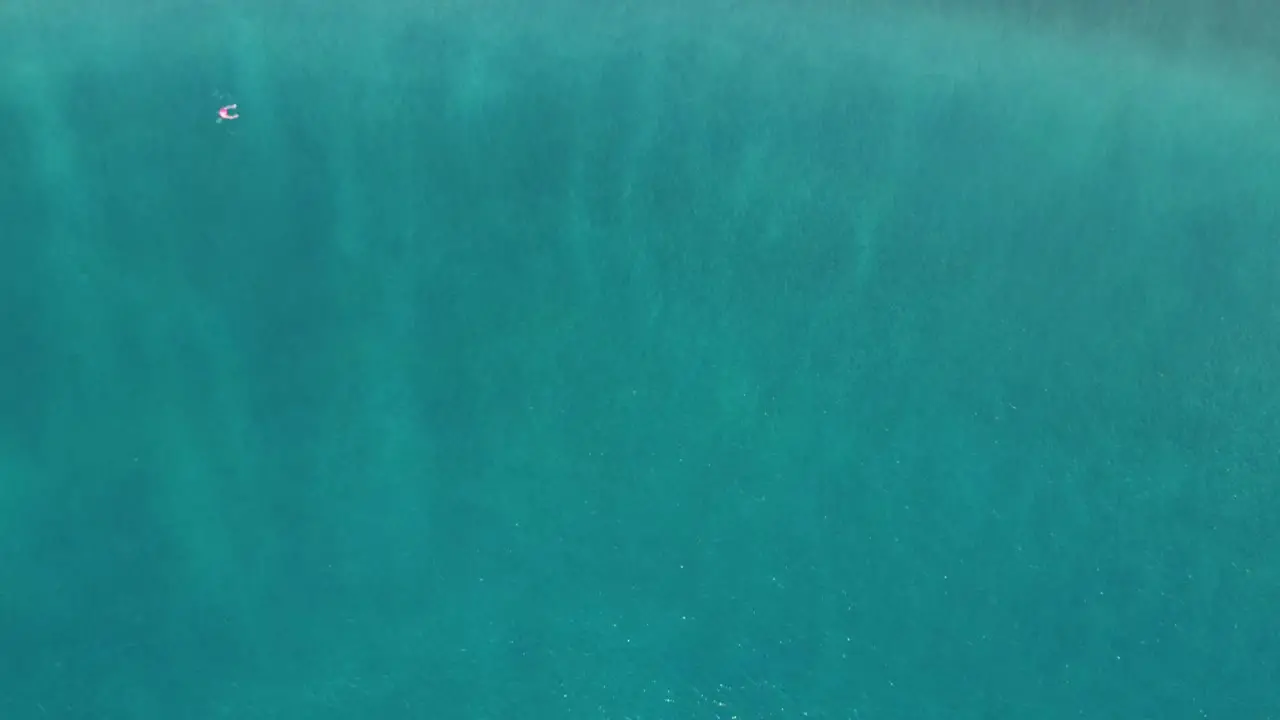 Sandy beach with waves turquoise blue water Las Vistas beach Tenerife Costa Adeje