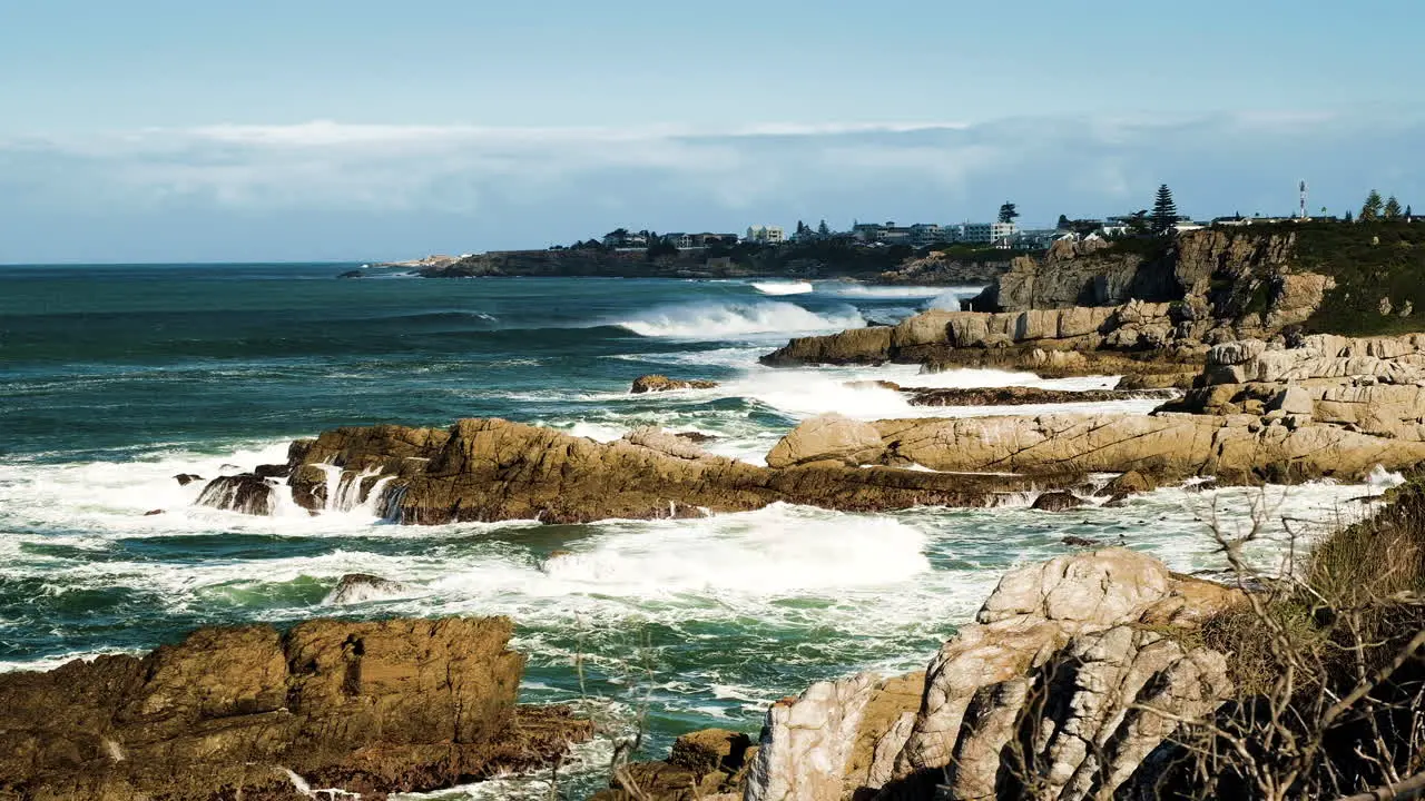 Atlantic waves crashing onto rocks hampered by strong offshore wind Hermanus