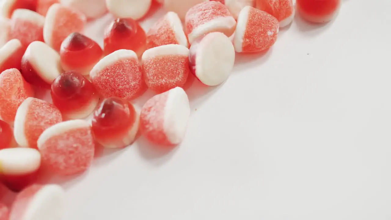 Close up view of halloween candy corn fallen against grey background