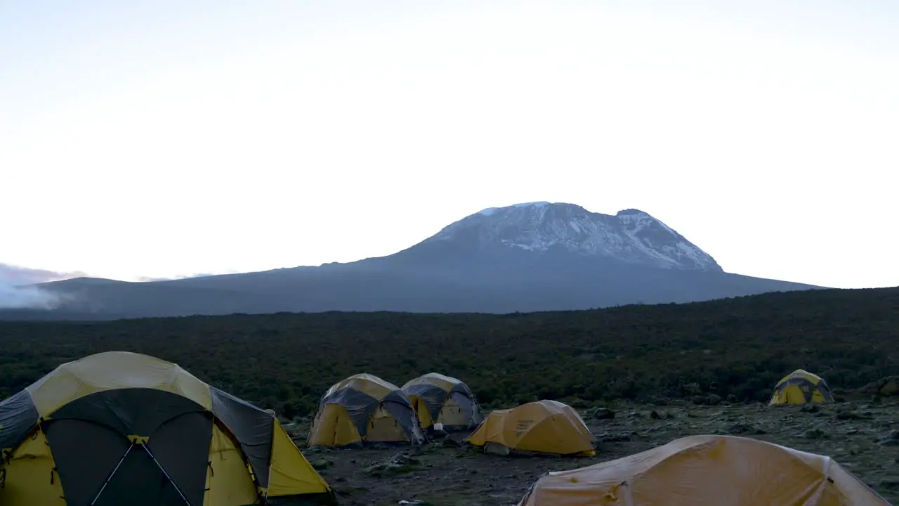 Timelapse of fog rolling in over a group of campers on Mount Kilimanjaro