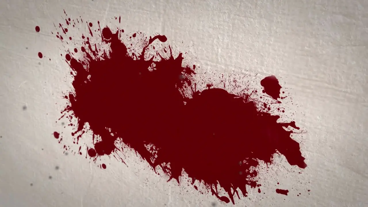 Animation of blood stain appearing on beige background