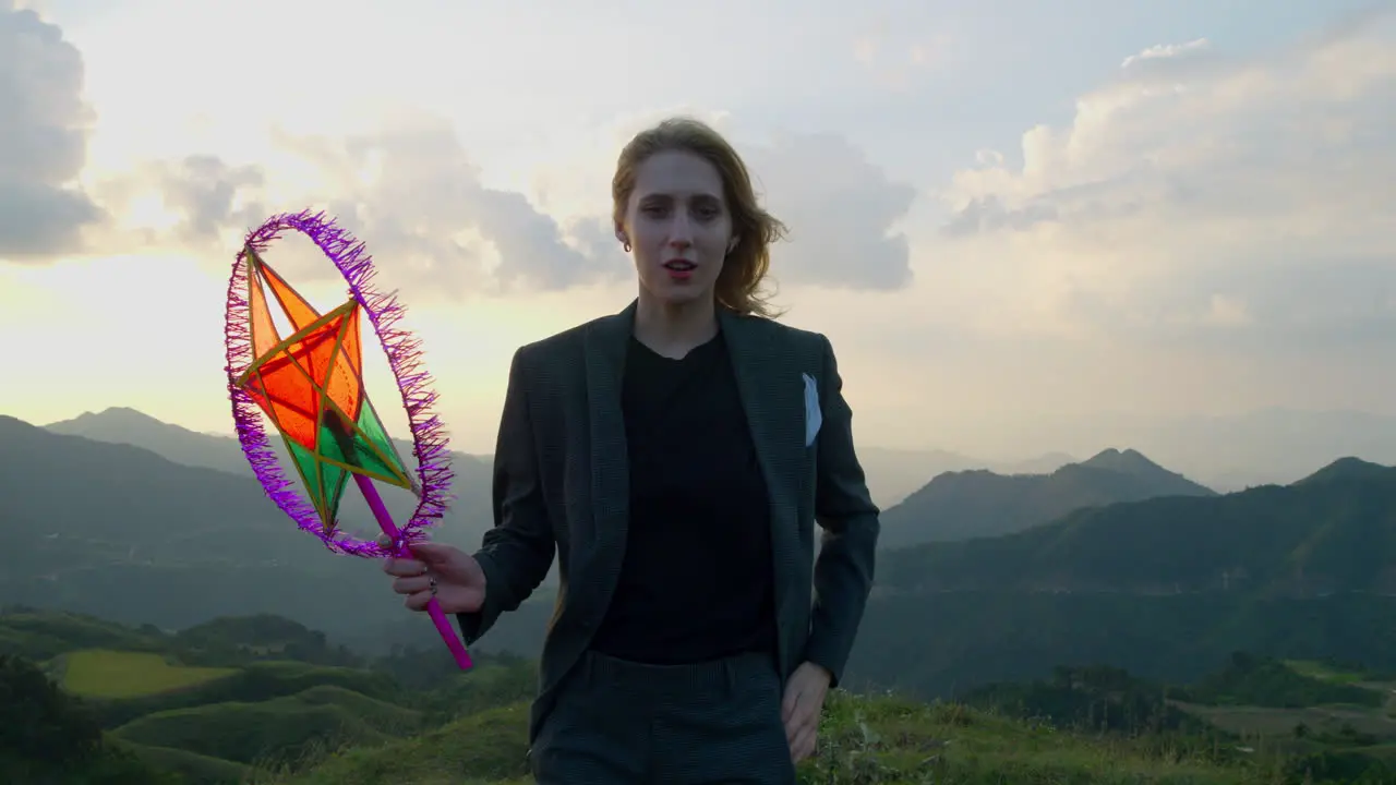 Slow motion shot of a woman holding a star lantern celebrating the mid-autumn festival