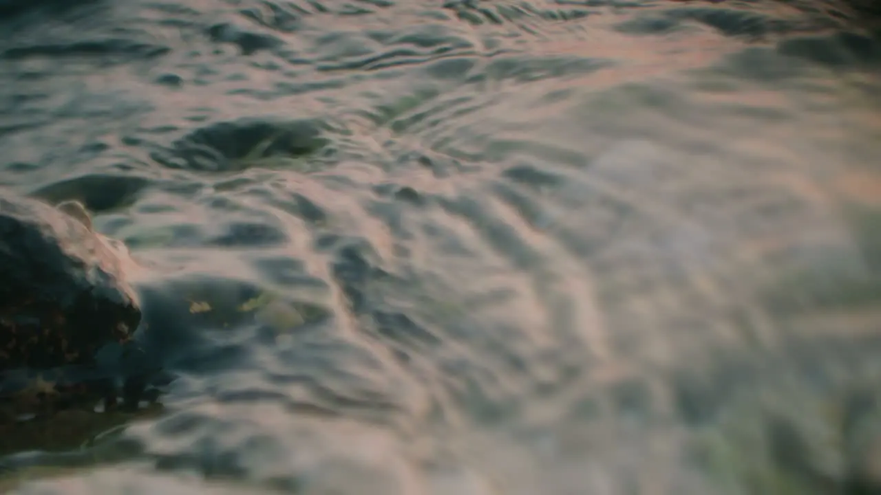 Water Surface At Sunset